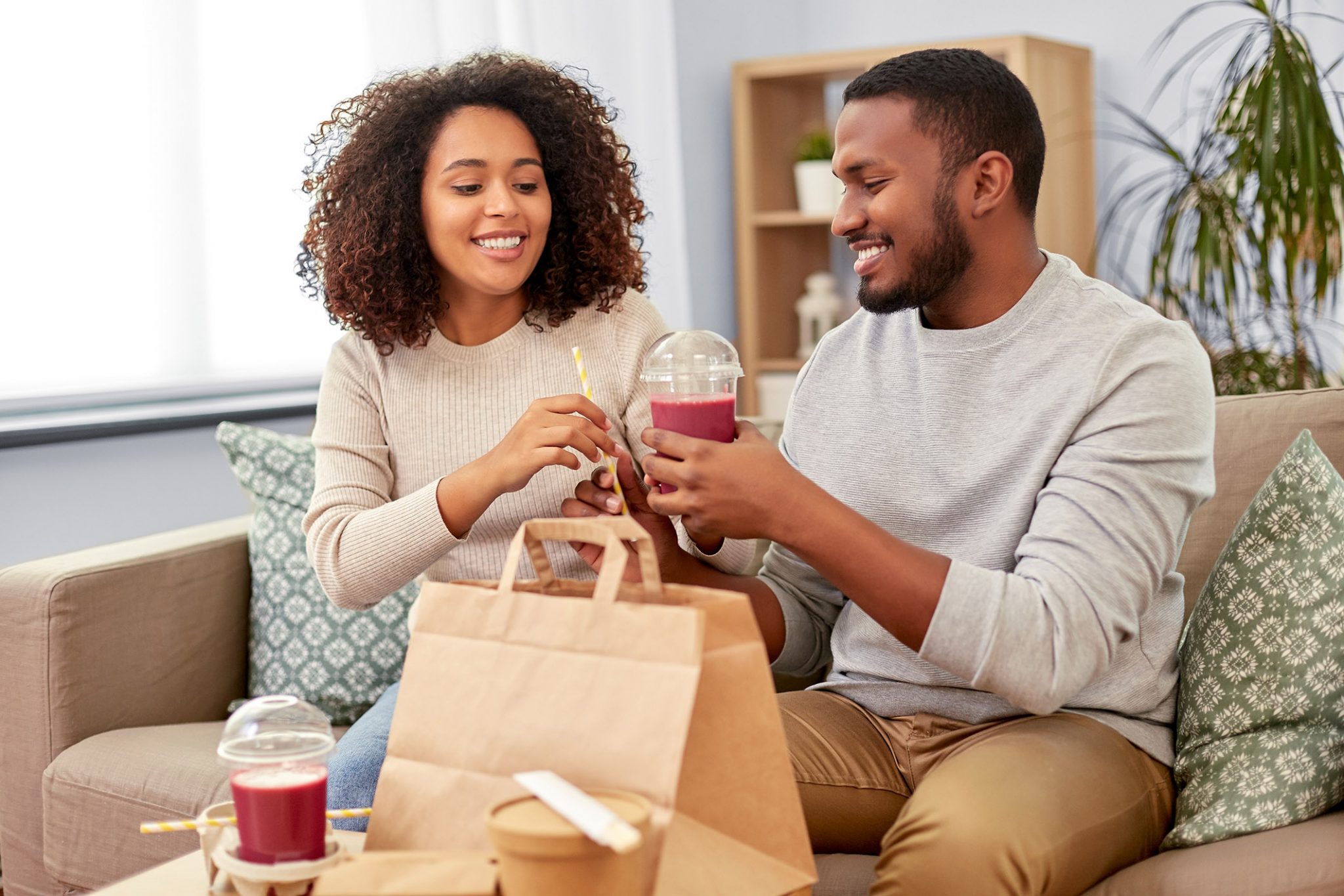 Couple enjoying coffee at Barrington Plaza Brentwood Apartments